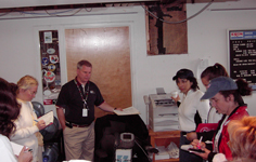 group of pilots get a last minute weather brief from Flight services